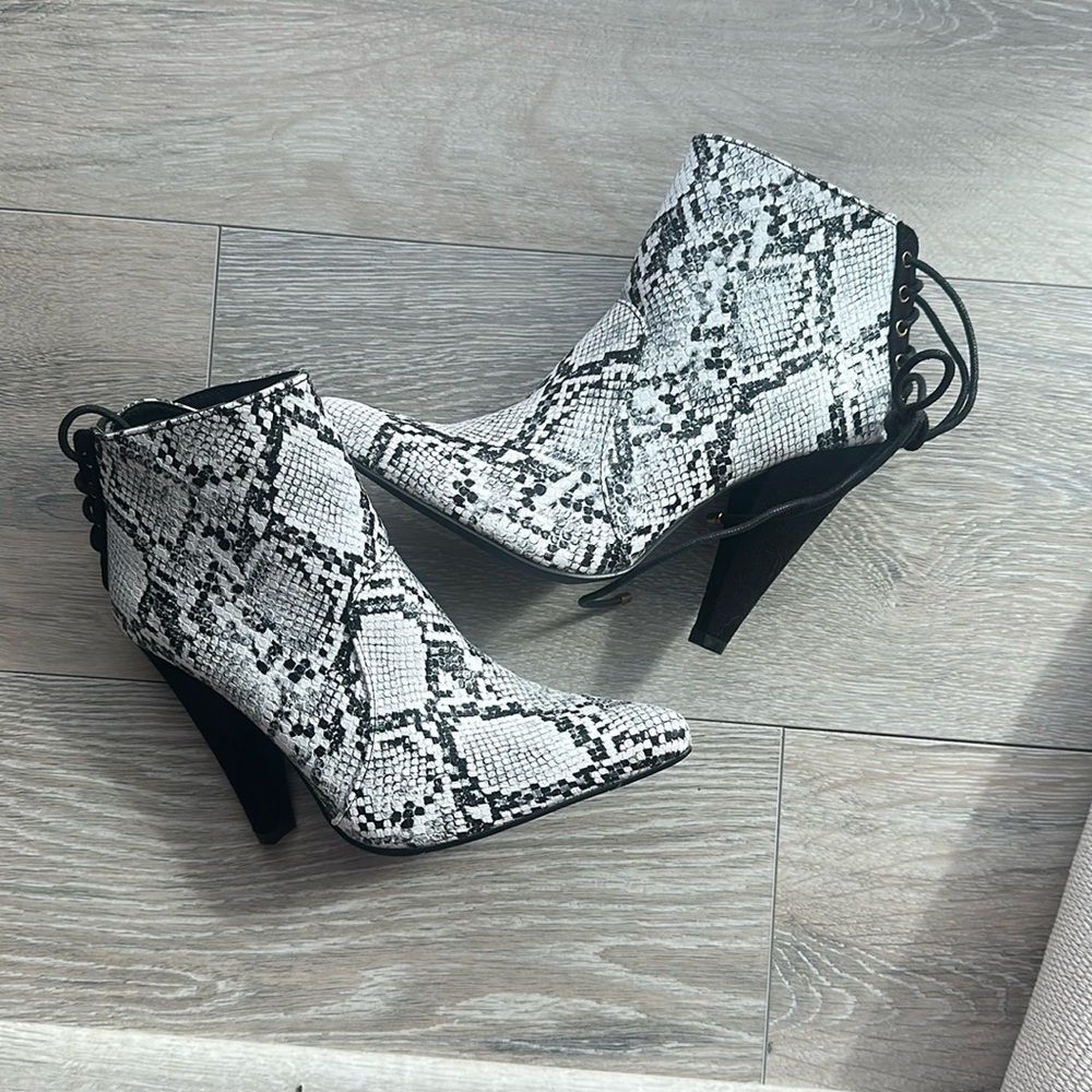 Shoe Dazzle size 6.5 heeled boots. Never worn. True to size